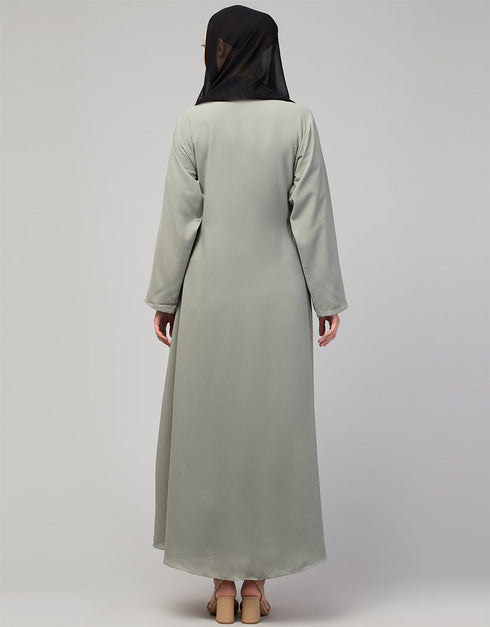 Dubai Abaya with front opening and hidden placket for everyday wear in Color Sage Green