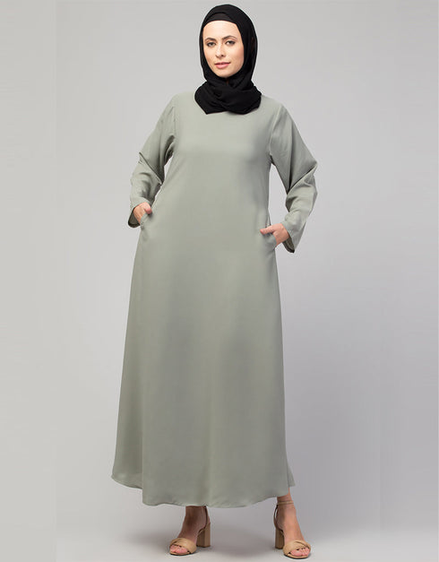 Dubai Abaya with front opening and hidden placket for everyday wear in Color Sage Green