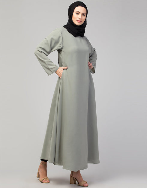 Dubai Abaya with front opening and hidden placket for everyday wear in Color Sage Green