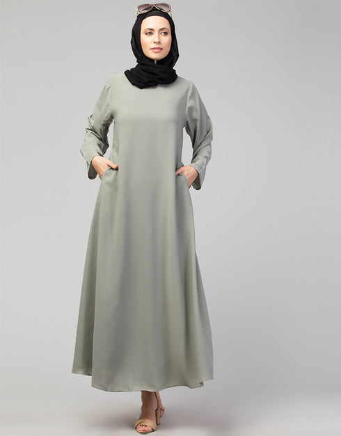 Dubai Abaya with front opening and hidden placket for everyday wear in Color Sage Green