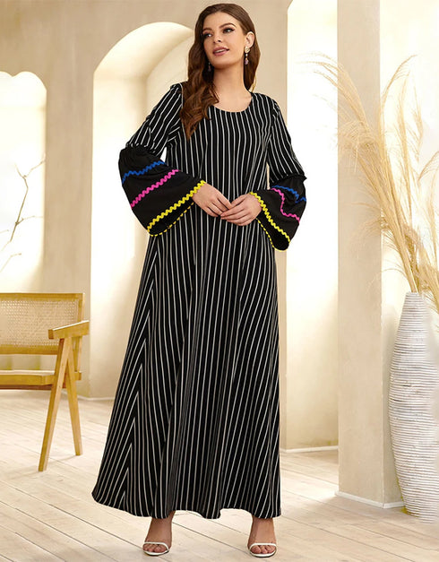 A Long Skirt Where Stripes Sing and Embroidery Dances