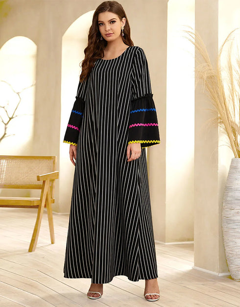 A Long Skirt Where Stripes Sing and Embroidery Dances