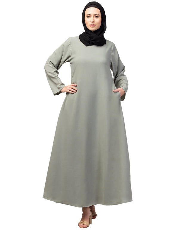 Dubai Abaya with front opening and hidden placket for everyday wear in Color Sage Green